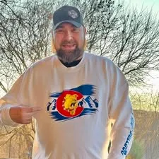 Supporter wearing Mile High Bulldogs apparel outdoors